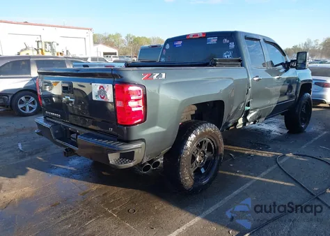 2018 Chevrolet Silverado 1500 2Lt from USA, damaged, VIN 1GCVKREC0JZ194386